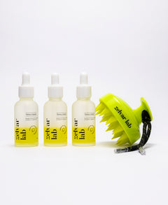 Kit capilar Zelvar Lab con tres tónicos y masajeador para cuidado del cabello