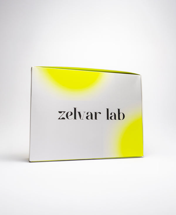 Empaque del kit capilar Zelvar Lab con tres tónicos y masajeador